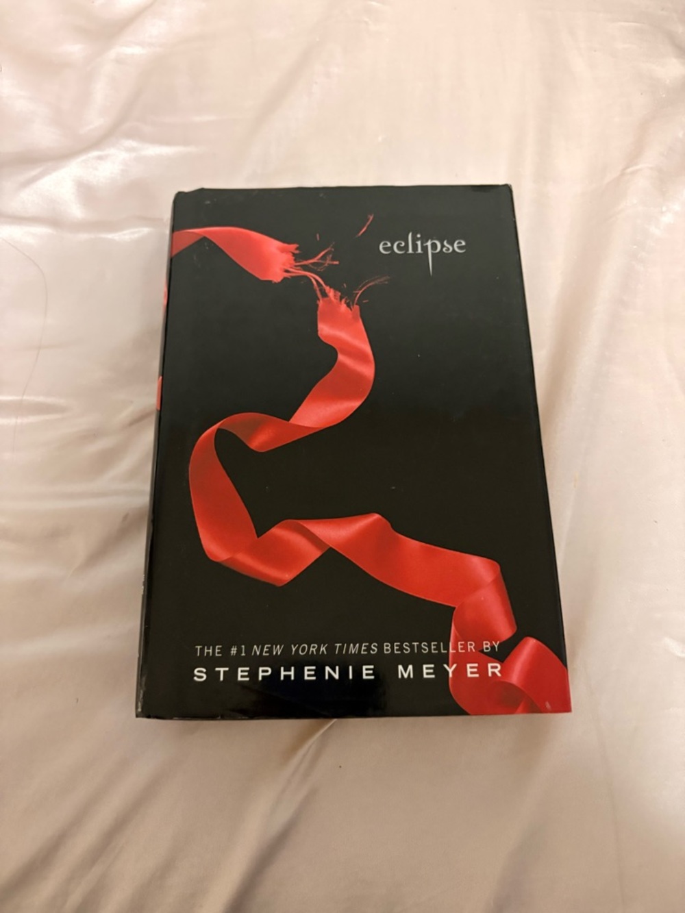 Eclipse by Stephenie Meyer - Black Cover with Red Ribbon Graphic